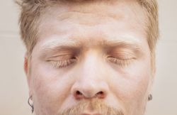 Close up portrait of an Latino man with albinism