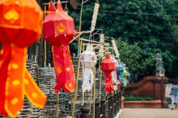 Multicolored traditional lanterns in garden