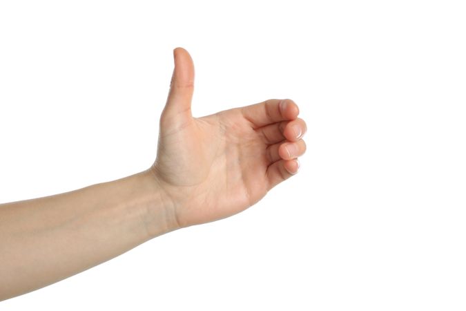 Female hand holding something, isolated on plain background