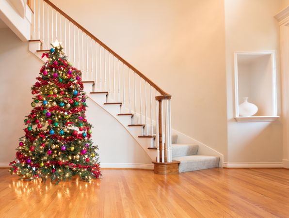Colorfully decorated Christmas on wooden oak floor