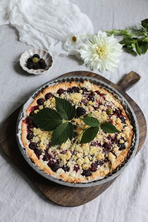 Freshly baked berry pie with crumble topping