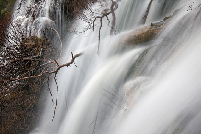 Wonderful waterfall near tree