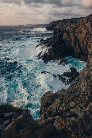Big rocks and wavy sea