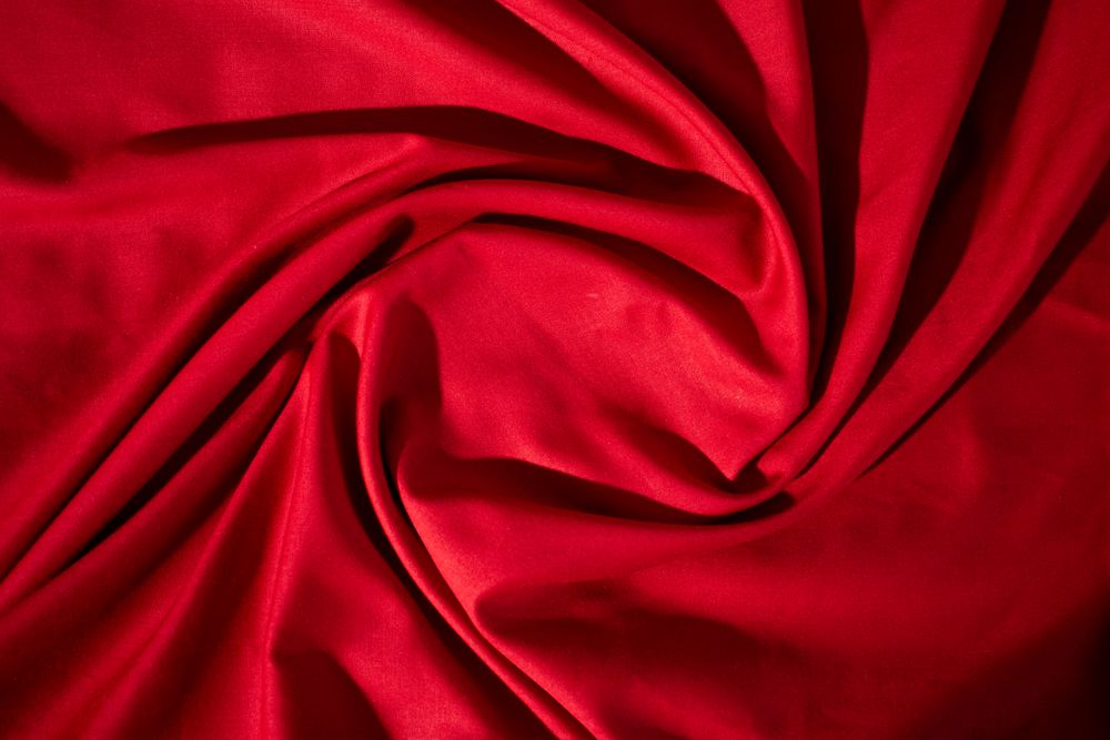 Silky Red Fabric Background Texture.