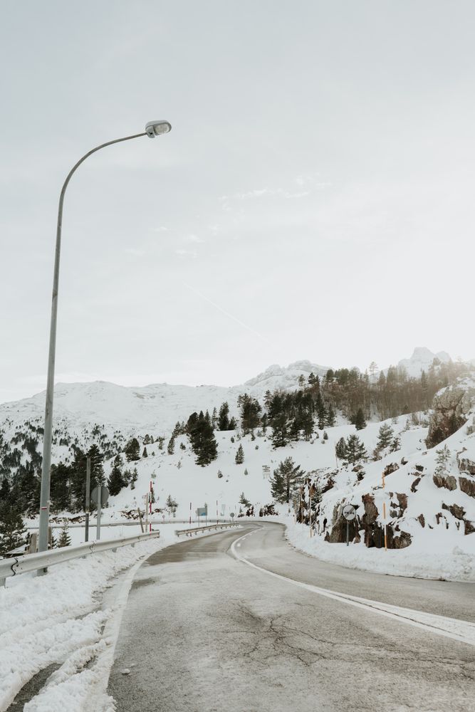 Wonderful view of hills in snow on a road