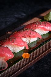 Delicious sushi set served on wooden tray