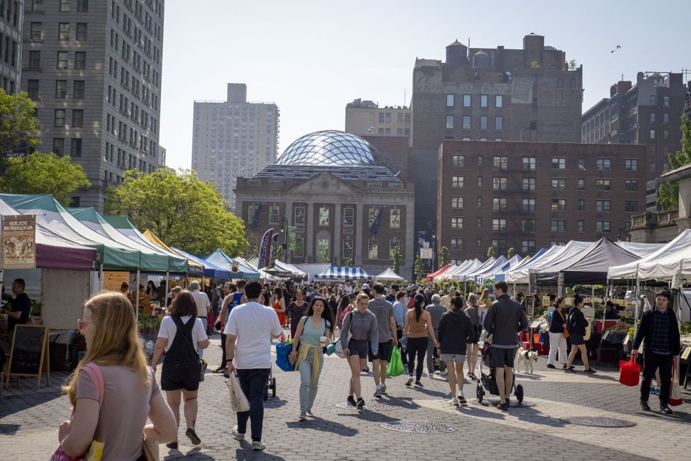 People walking at the Union Square Greenmarket in New York City