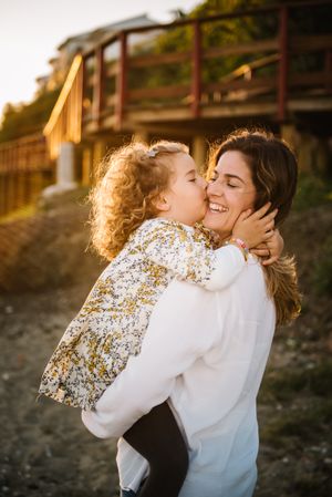 Mother with her daughter at beach