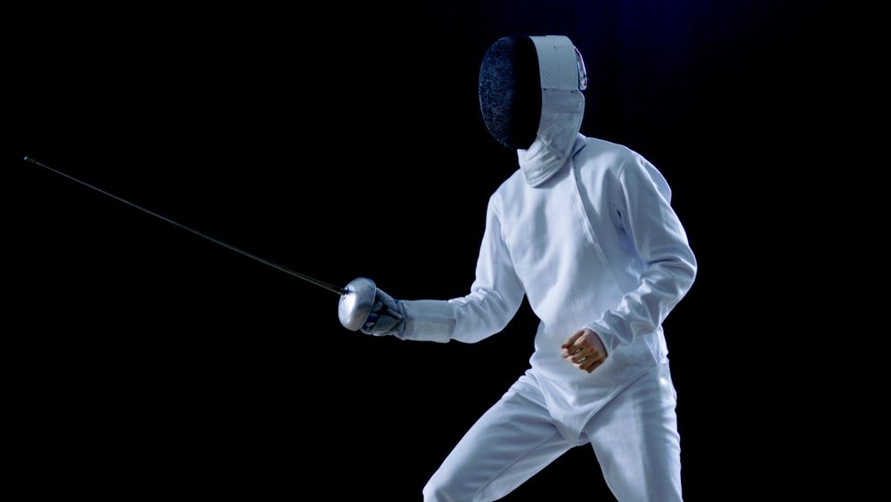 One Professional Fencer is Standing Ready for Fighting.