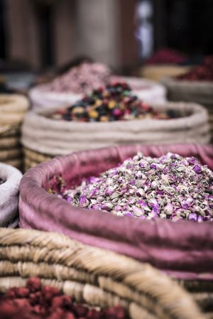 Baskets with dried spices on marketplace