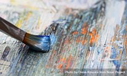 Closeup of brush on canvas bEl1M4