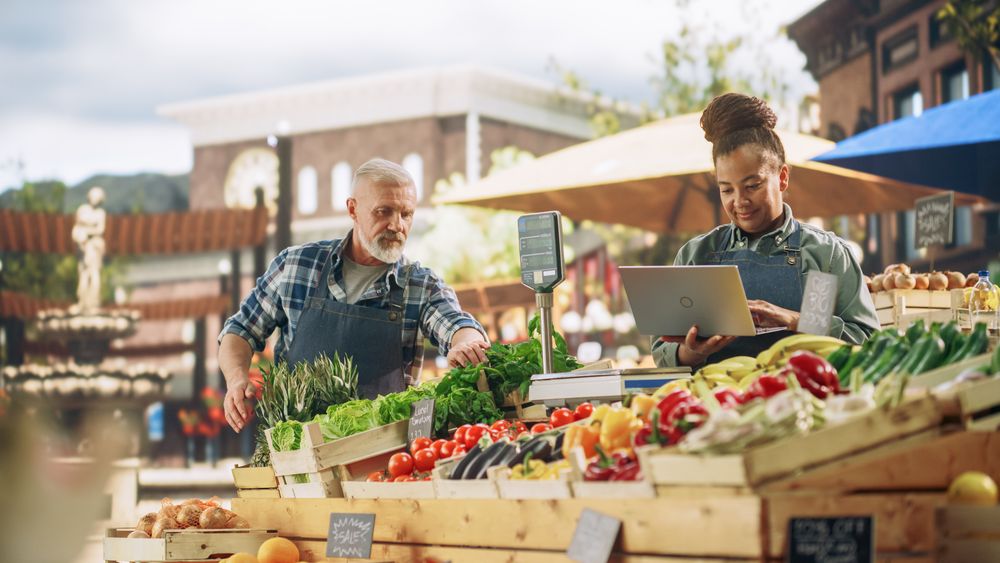 Local Farmers Running a Family Business, Offering Sustainable Farm Produce for Sale.