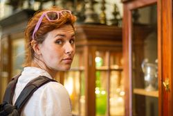 Female traveler in souvenir shop