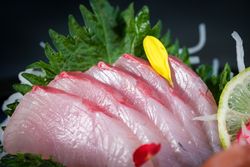 Tasty yellowtail sashimi with lime