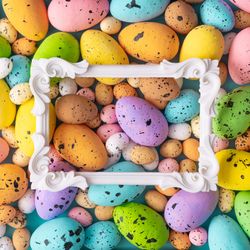 Easter composition made with colorful eggs and square outline
