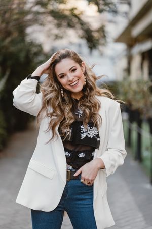 Charming woman posing on street