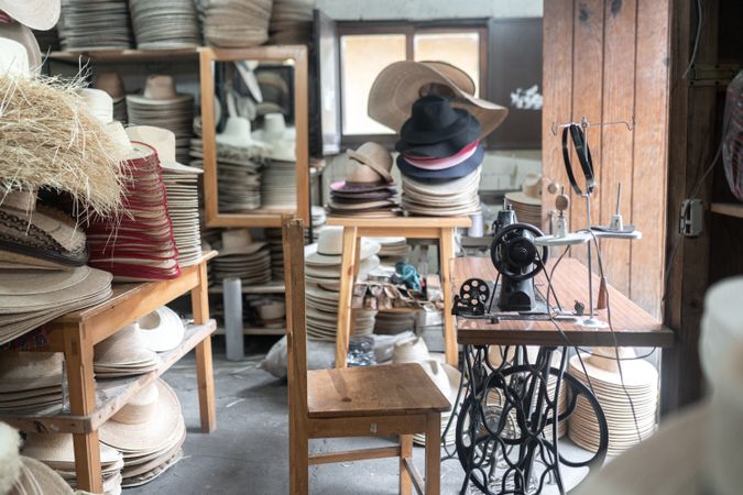 Sewing machine table in a traditional hat workshop