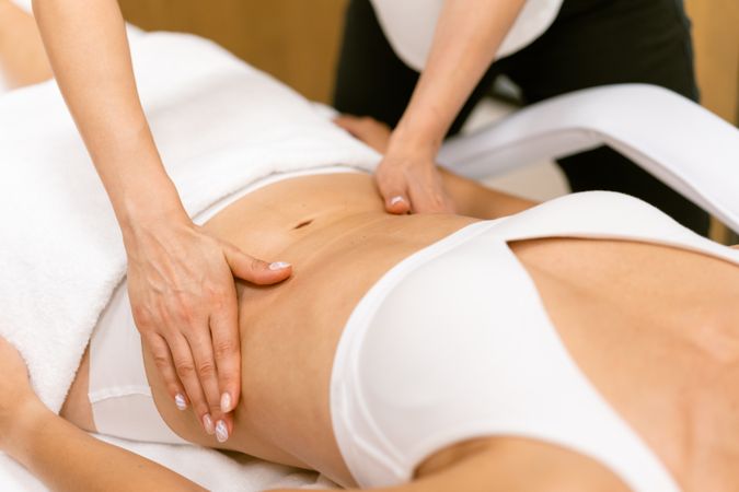 Woman’s torso being massaged