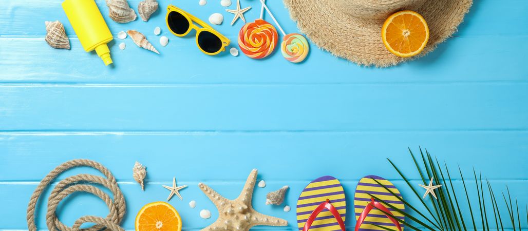 Flat lay composition with summer vacation accessories on color background, space for text and top view. Happy holidays