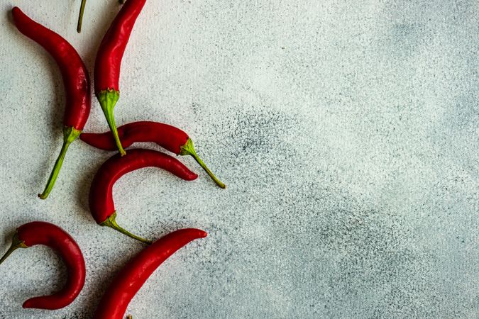 Red hot chilli pepper on grey counter