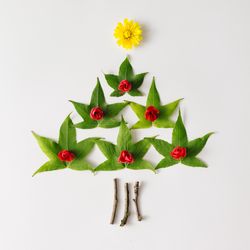 Christmas tree made of leaves and flowers