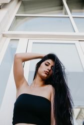 Woman posing near window