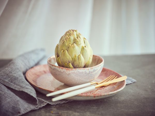 Delicious artichoke served in kitchen