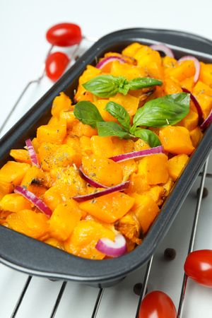 Concept of tasty homemade dish - baked pumpkin