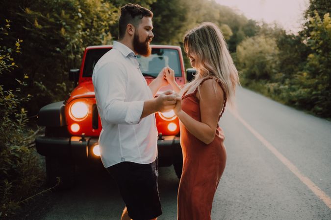 Loving couple dancing on road