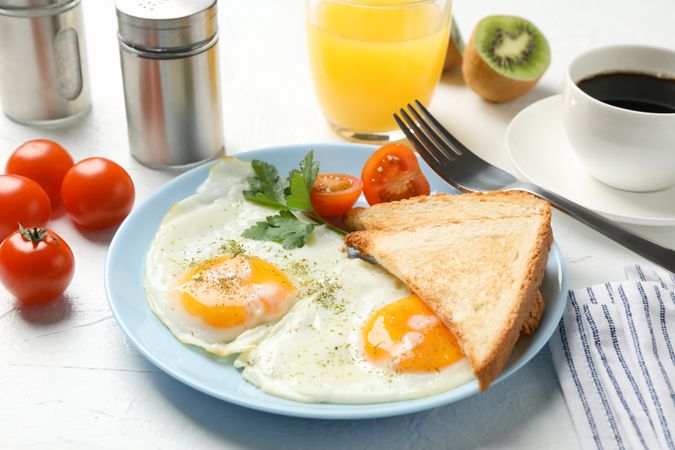 Plate of breakfast on blue plate