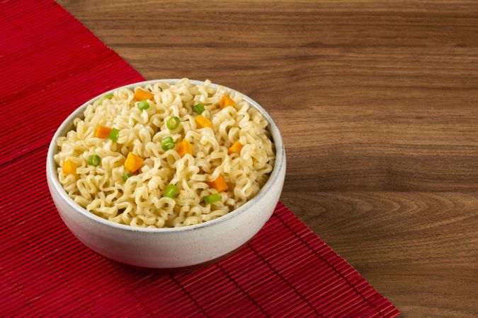 Bowl with instant noodles on the table.