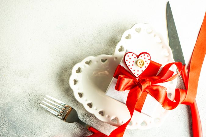 Valentine's Day red themed table setting with heart shaped plate
