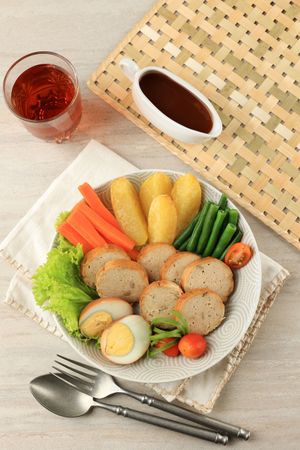 Top View Selat Solo Galantine, Javanese Steak with Meatloaf and Steamed Vegetable