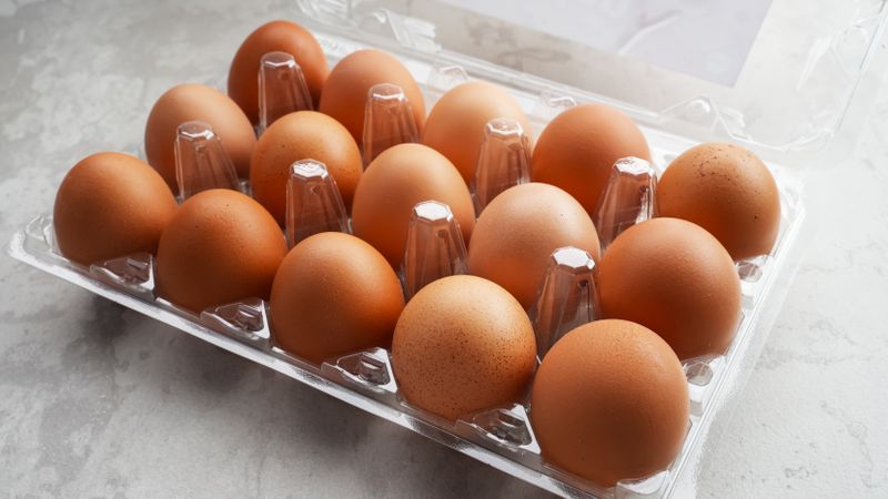 Organic chicken eggs in plastic packaging