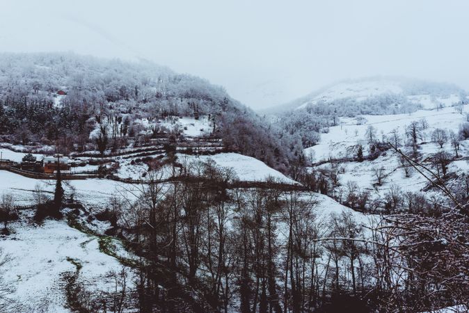 Amazing winter valley near hills