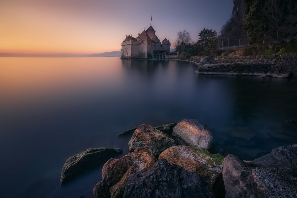 Peaceful landscape of lake in sunset time