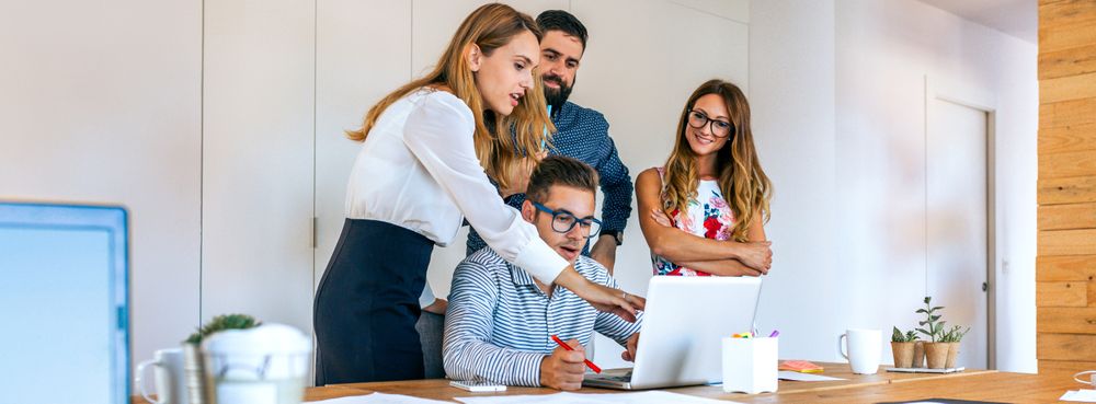 Business people checking project on the laptop