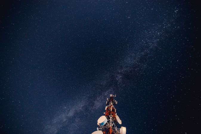Radio tower against starry sky