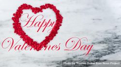 Red outline of heart for Valentine’s day holiday on marble stone with text message 5o2j80