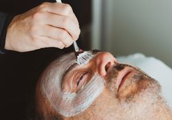 Man getting a facial treatment