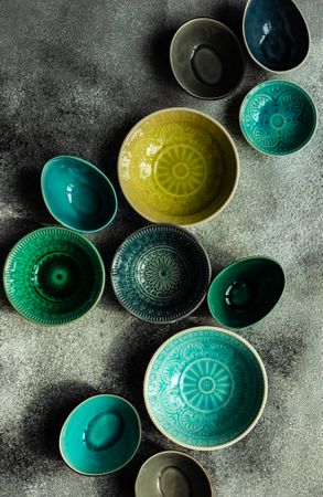 Empty ceramic bowls on stone background