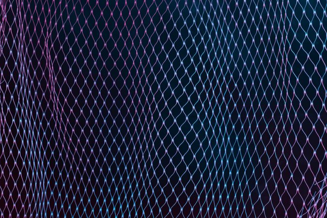 Abstract mesh net background with colorful ultraviolet holographic neon lights