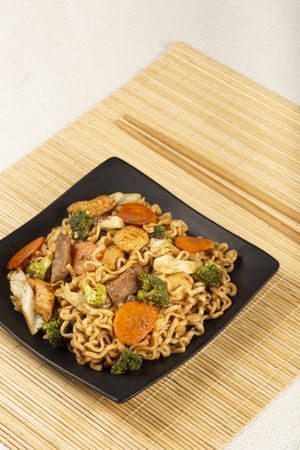 Yakisoba noodles. Yakisoba dish with meat, chicken and vegetables.