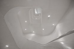 Amazing modern hall interior with white stairway