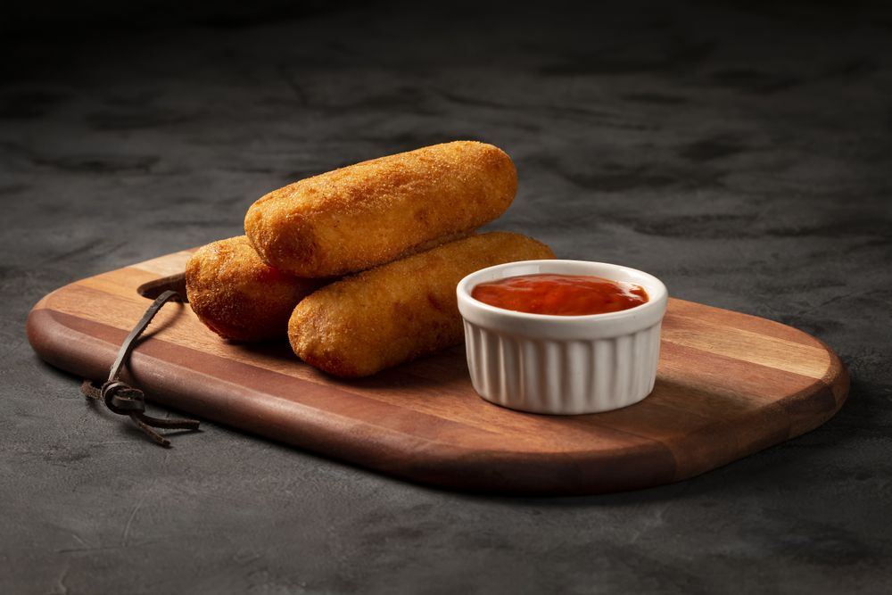 Fried risoles or Risol. Risoles stuffed with cheese and ham.