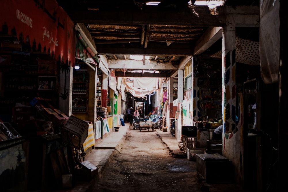 Marketplace in dark grungy passage