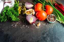 Vegetables ready for dinner prep on counter with copy space