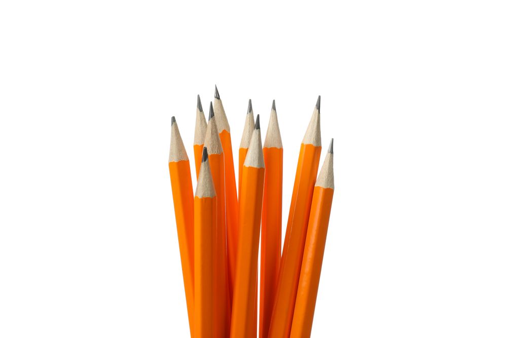 Orange office pencils isolated on plain background