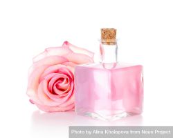 Rose water bottle on light background with rose 48kdZ5