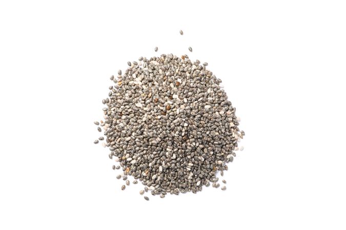 Heap of chia seeds isolated on plain background